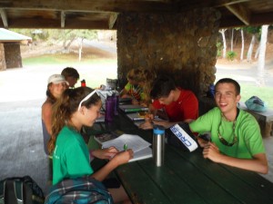 Getting some study time during every spare break. We are at Hapuna Beach for a sunset dinner.